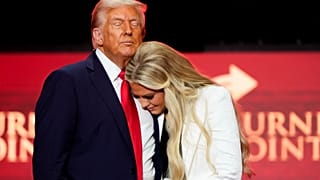 Donald Trump y su esposa Melania, en el acto de Charlie Kirk