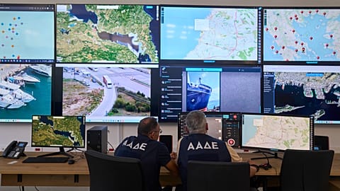 Inspectors of the Independent Authority for Public Revenue monitor transactions in real time at the headquarters of AADE in Athens, Greece, on Sept. 16, 2025.