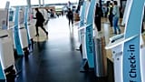Check-in counters at a terminal at Berlin's Brandenburg airport, in Schönefeld, Germany.