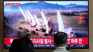 A TV screen shows a file image of North Korea's missiles launch during a news programme at Seoul Railway Station in Seoul, 30 May, 2024