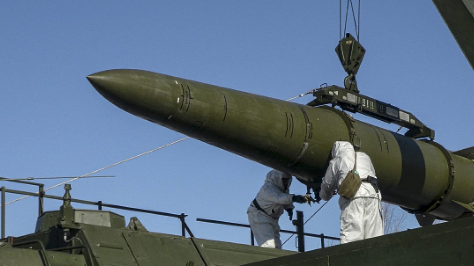 Russian troops load an Iskander missile during a tactical nuclear weapon drill at an undisclosed location in Russia, 21 May, 2024