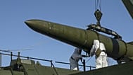 Russian troops load an Iskander missile during a tactical nuclear weapon drill at an undisclosed location in Russia, 21 May, 2024