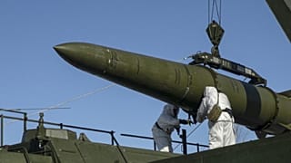 Russian troops load an Iskander missile during a tactical nuclear weapon drill at an undisclosed location in Russia, 21 May, 2024