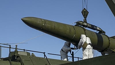 Russian troops load an Iskander missile during a tactical nuclear weapon drill at an undisclosed location in Russia, 21 May, 2024