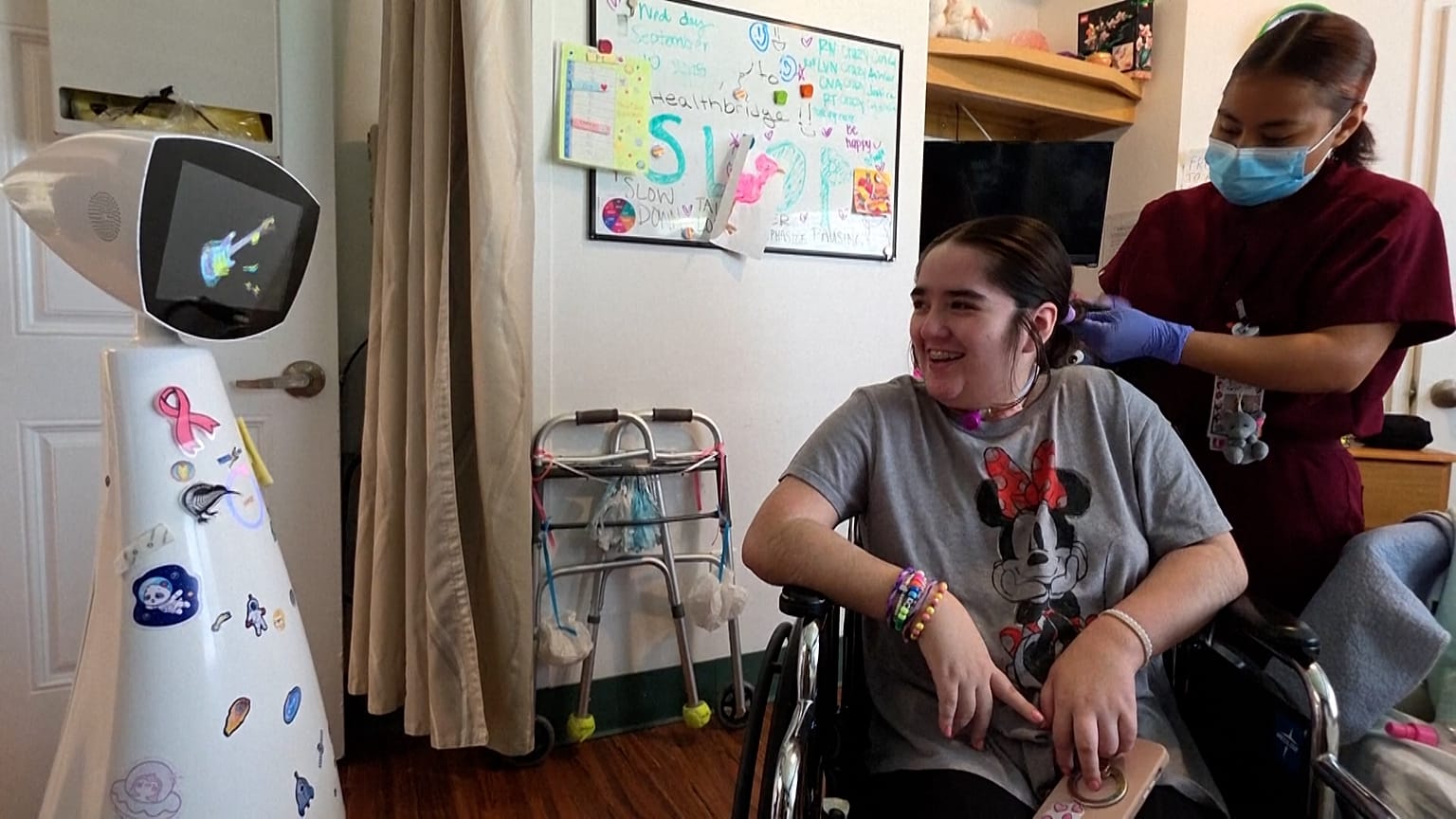 This therapeutic robot can navigate hospital wards and check on sick kids.