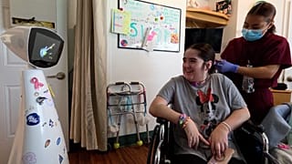 This therapeutic robot can navigate hospital wards and check on sick kids.