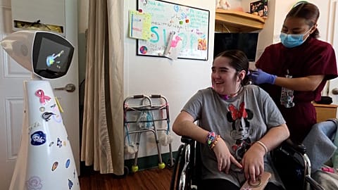 This therapeutic robot can navigate hospital wards and check on sick kids.