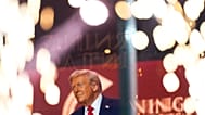 US President Donald Trump walks on stage to speak at a memorial for conservative activist Charlie Kirk, Sept. 21, 2025, (AP Photo)