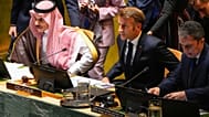 Saudi Arabia foreign minister Faisal bin Farhan Al-Saud, left, and France President Emmanuel Macron, center