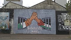 Wandgemälde zur Unterstützung Palästinas in Belfast, Nordirland. 