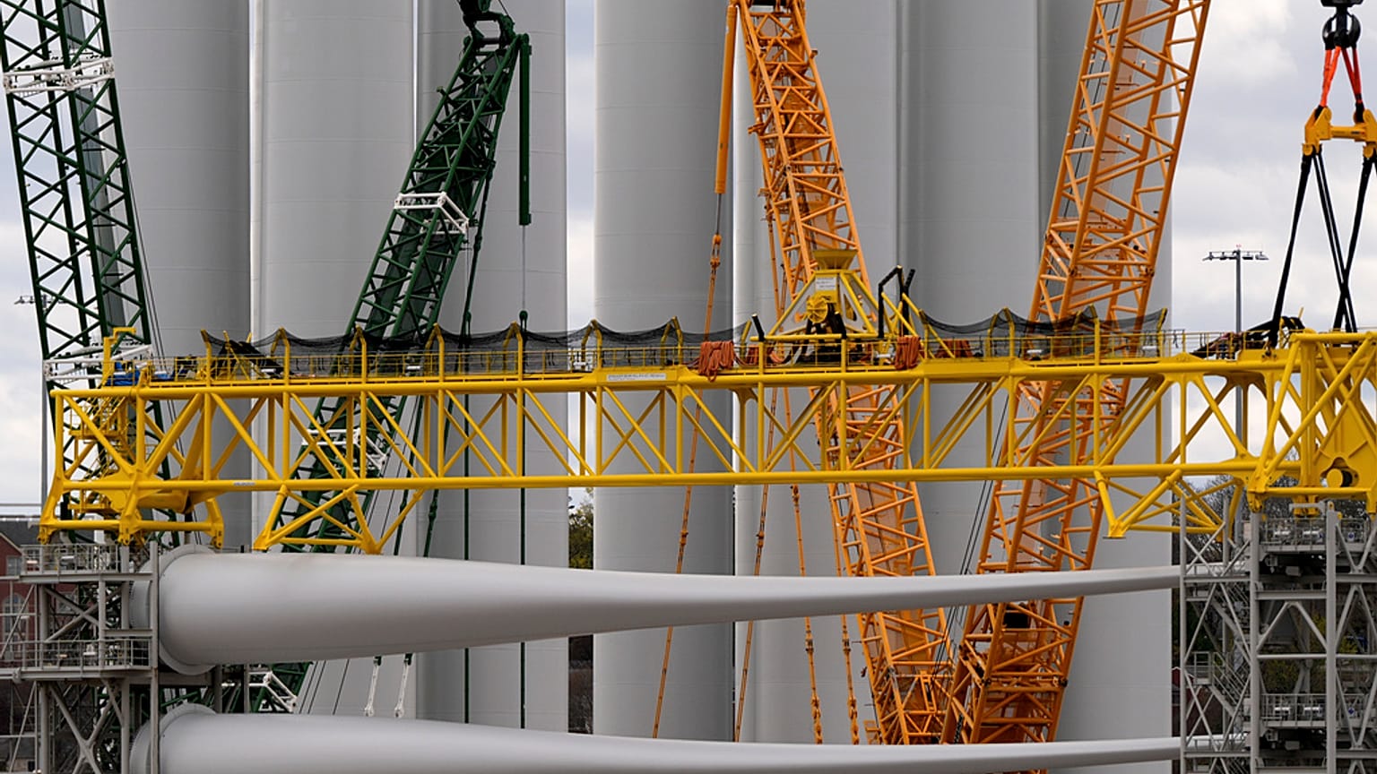 FILE - Wind turbine components sit at New London State Pier, 16 April 2025, in New London, Conn. 
