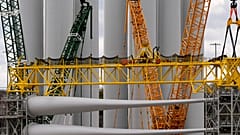 FILE - Wind turbine components sit at New London State Pier, 16 April 2025, in New London, Conn. 