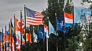 Participants' flags wave in the wind in front of the venue ahead of the NATO summit in The Hague, 23 June, 2025