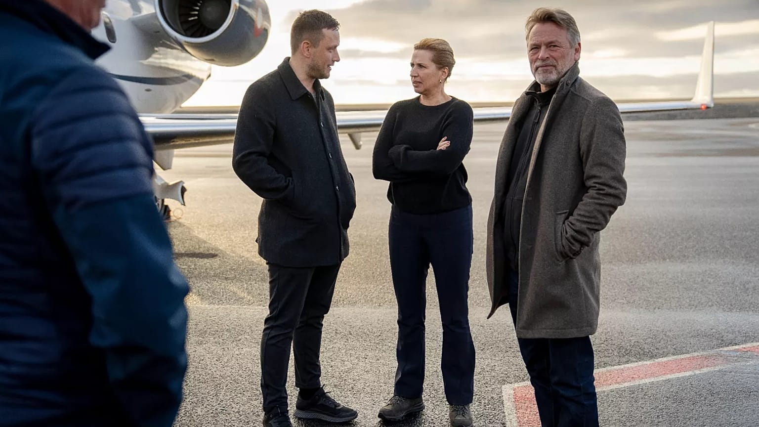 Chairman of the Naalakkersuisut Jens-Frederik Nielsen welcomes Danish Prime Minister Mette Frederiksen and her husband at Nuuk airport in Greenland, on Tuesday, Sept. 23, 2025