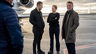 Chairman of the Naalakkersuisut Jens-Frederik Nielsen welcomes Danish Prime Minister Mette Frederiksen and her husband at Nuuk airport in Greenland, on Tuesday, Sept. 23, 2025