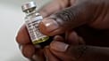 A pharmacist holds a vial of lenacapavir in Cape Town, South Africa, on July 23, 2024. 