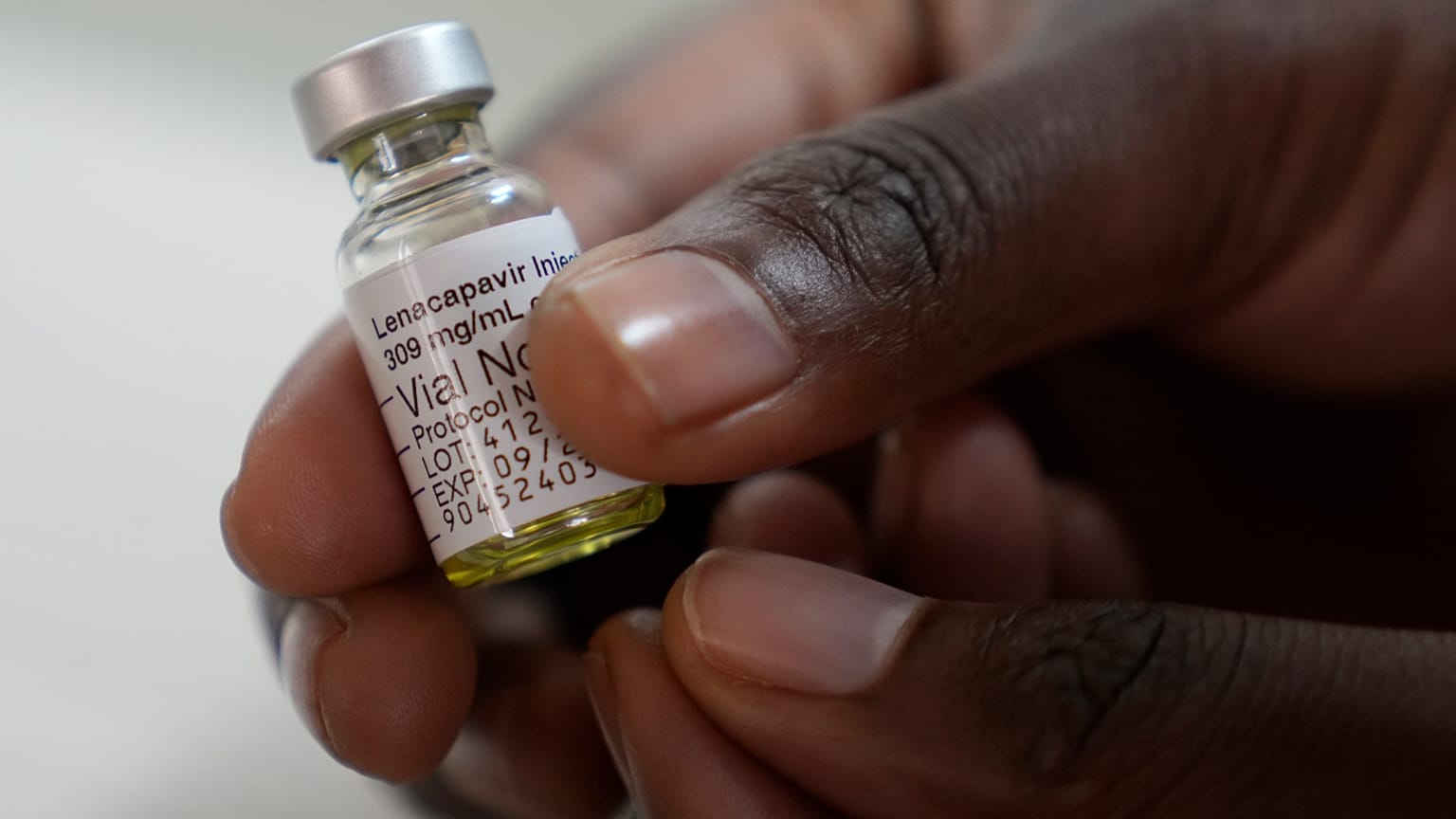 A pharmacist holds a vial of lenacapavir in Cape Town, South Africa, on July 23, 2024. 