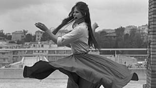 Dancing on the terrace: Claudia Cardinale swirled on the 1959 Cannes Film Festival poster