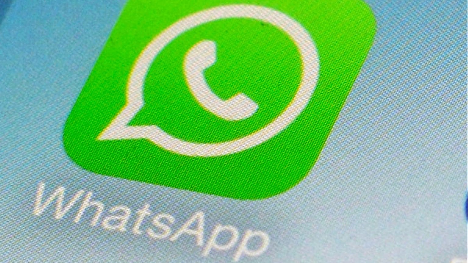 This Feb. 19, 2014, file photo, shows the WhatsApp app icon on a smartphone in New York.