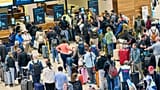 The attack snarled up check-in and left airline staff trying options like handwriting boarding passes or using backup laptops. 