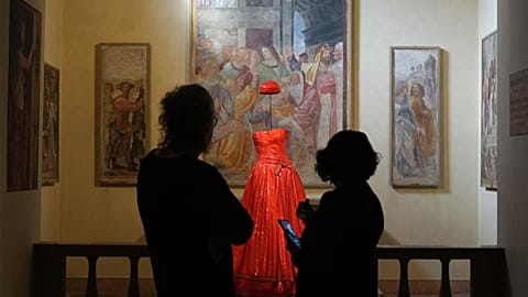Giorgio Armani's sartorial creations interplay with Italian masterpieces at Milan museum exhibition 
