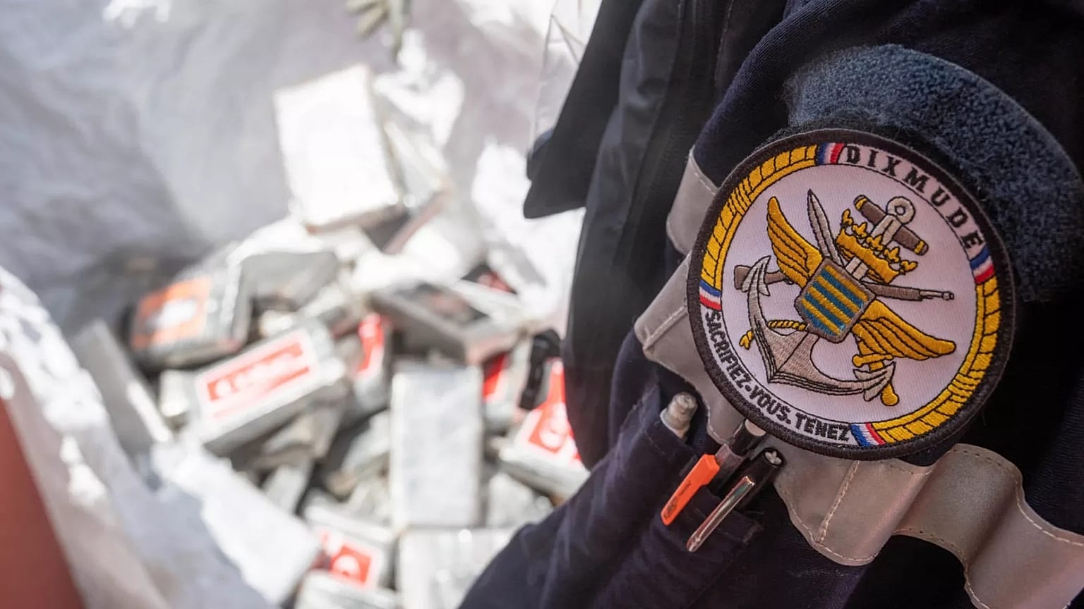 A French soldier checks packages containing cocaine off Guinea, 21 March, 2021