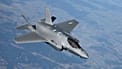 A US Air Force F-35 Lightning II aircraft departs from a KC-10 Extender aircraft after receiving fuel over Poland, 24 February, 2022