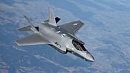 A US Air Force F-35 Lightning II aircraft departs from a KC-10 Extender aircraft after receiving fuel over Poland, 24 February, 2022