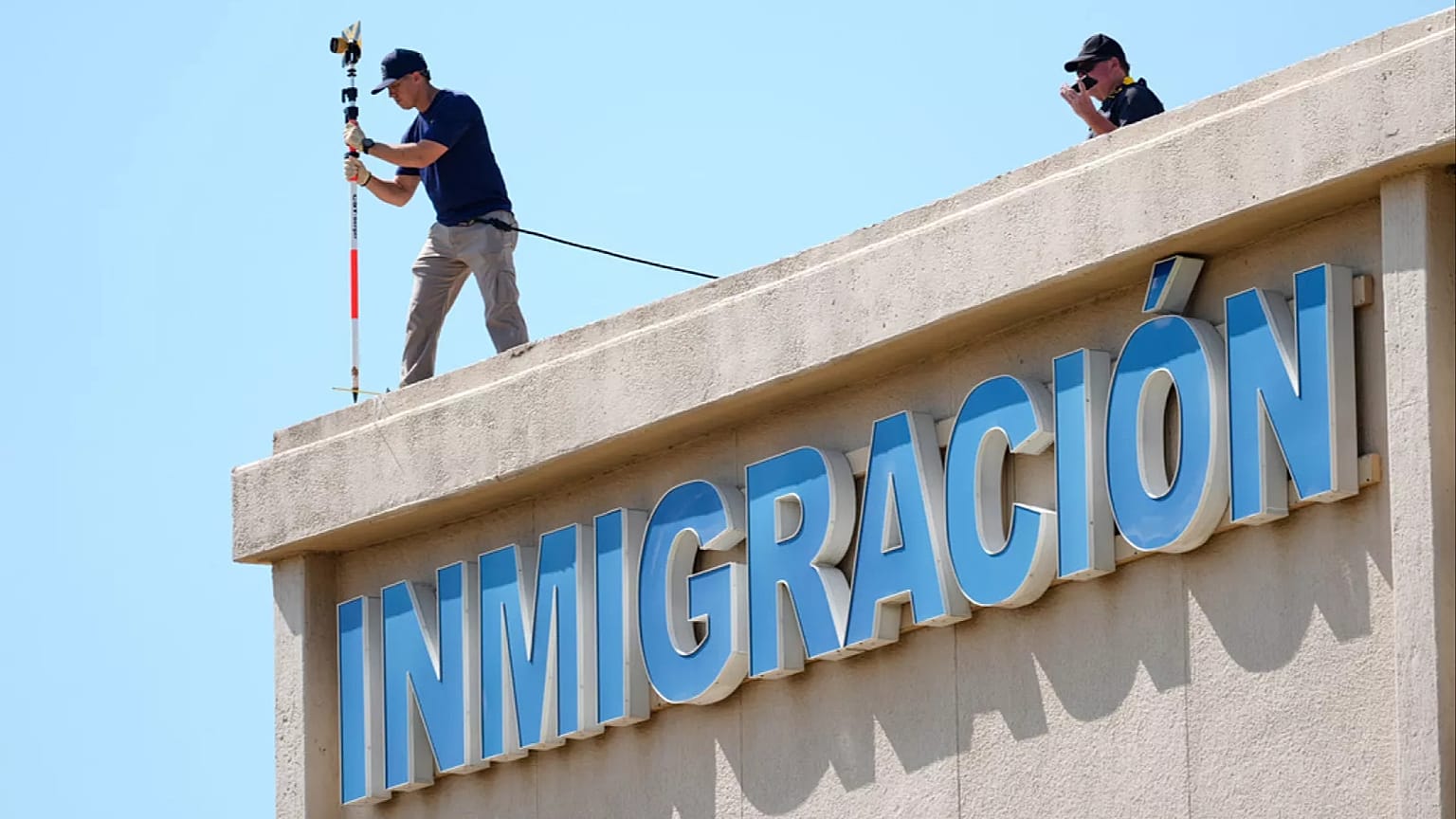 FBI agents investigate the crime scene near a U.S. Immigration and Customs Enforcement office Thursday, Sept. 25, 2025, in Dallas.