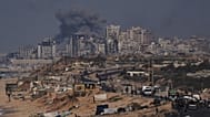 Smoke rises following an Israeli military strike in Gaza City, as seen from the central Gaza Strip, Friday, Sept. 26, 2025. (AP Photo/Abdel Kareem Hana)