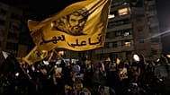Οι άνθρωποι συγκεντρώνονται στο σημείο όπου σκοτώθηκε ο ηγέτης της Χεζμπολάχ Χασάν Νασράλα από ισραηλινές αεροπορικές επιδρομές στις 27 Σεπτεμβρίου 2024, μία ημέρα πριν από την πρώτη επέτειο του θανάτου του, στα προάστια της Βηρυτού