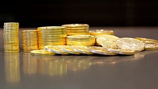In this 1 July 2016, photo, gold coins are on display at the office of Philip Diehl in Austin, Texas. 