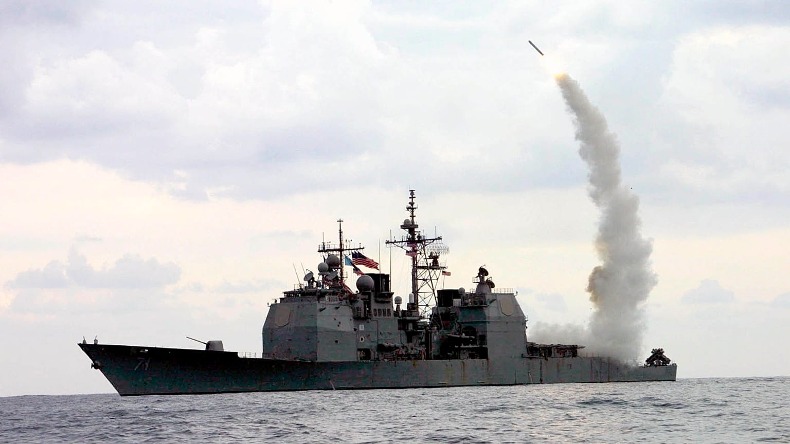 FILE - A Tomahawk Land Attack Missile (TLAM) launches from the guided missile cruiser USS Cape St. George (CG 71), in operation in the Mediterranean Sea, on March 23, 2003.
