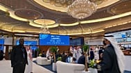 Delegates for the Global Cybersecurity Forum meet in a corridor at the Ritz Carlton in Riyadh, Saudi Arabia