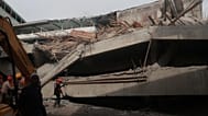 Rescuers search for survivors after a building under construction collapsed, at an Islamic boarding school in Sidoarjo, East Java, Indonesia, Tuesday, Sept. 30, 2025. 