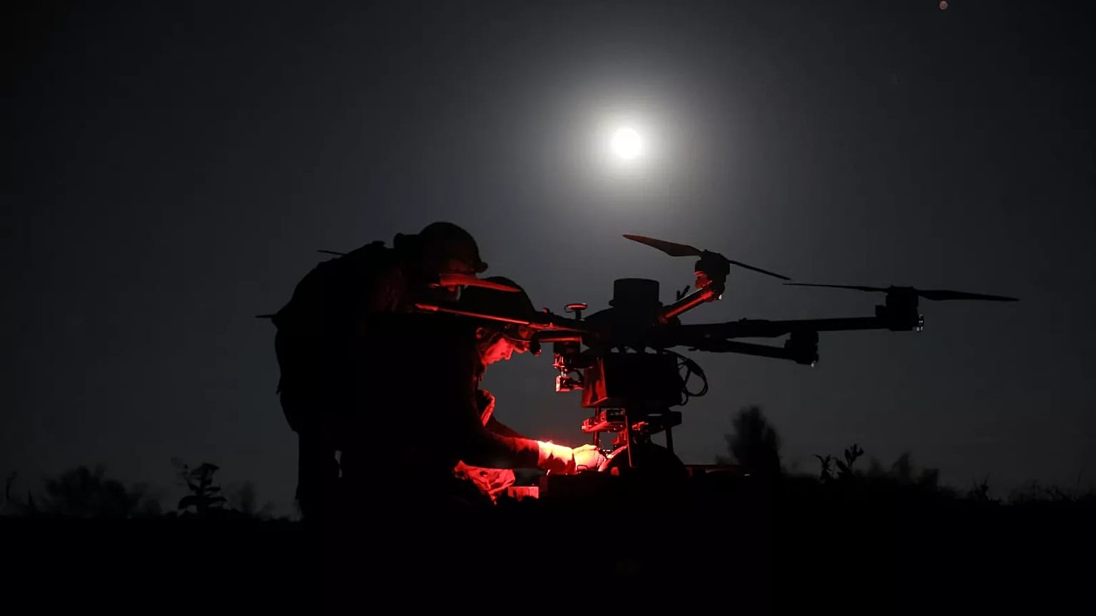 Ukrainian servicemen prepare a Kazkhan drone that delivers supply and carry heavy bombs on the front line near Chasiv Yar, 15 May, 2025