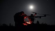 Ukrainian servicemen prepare a Kazkhan drone that delivers supply and carry heavy bombs on the front line near Chasiv Yar, 15 May, 2025
