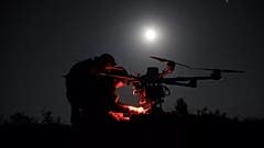 Ukrainian servicemen prepare a Kazkhan drone that delivers supply and carry heavy bombs on the front line near Chasiv Yar, 15 May, 2025