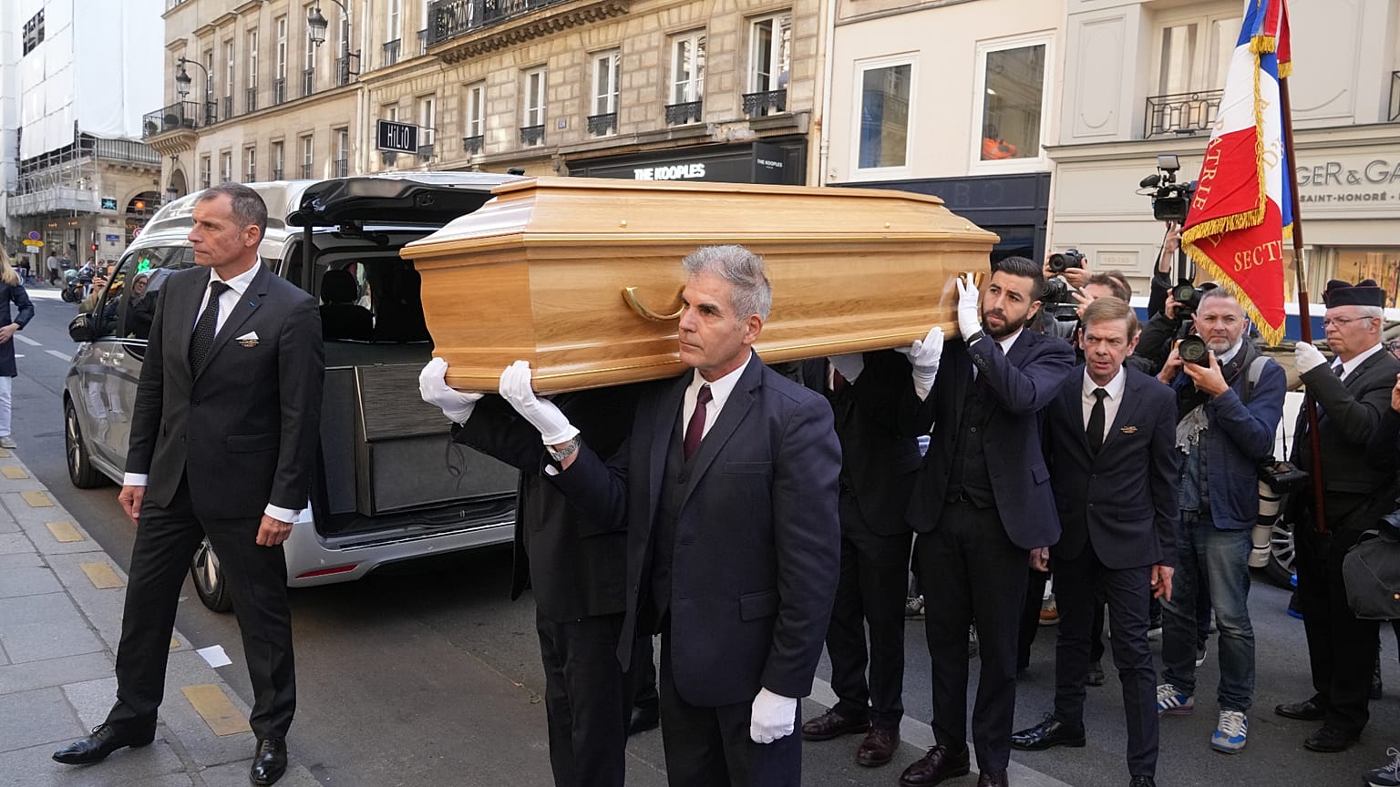 Pallbearers carry the casket of actor Claudia Cardinale as part of her funeral ceremony,