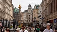 People walk on the shopping street Graben in Vienna, Austria, 