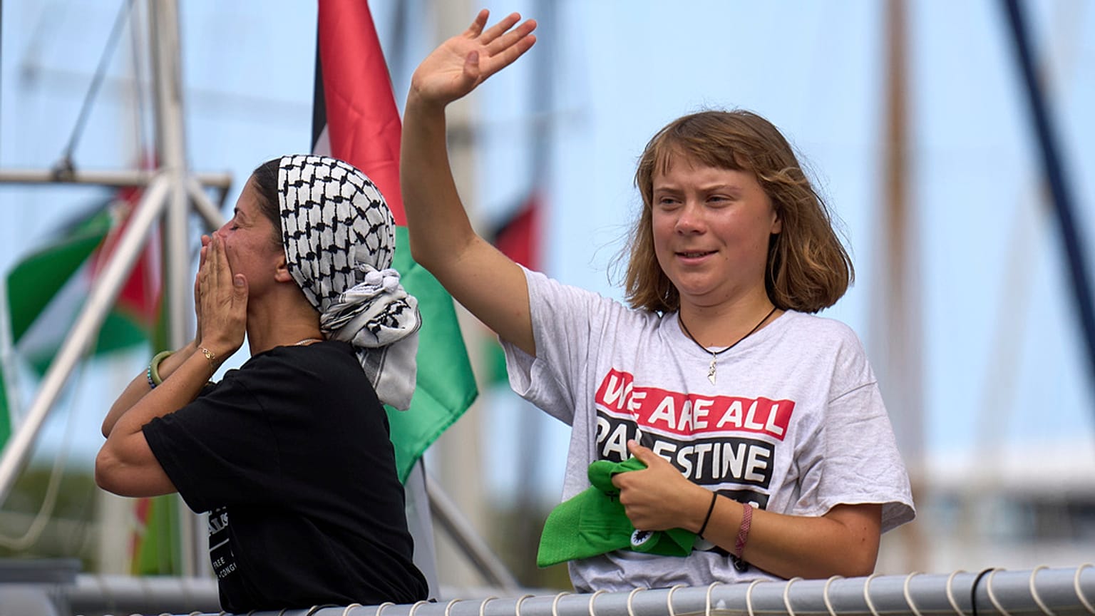 FILE: Activist Greta Thunberg waves from a boat, in Barcelona, 31 August 2025