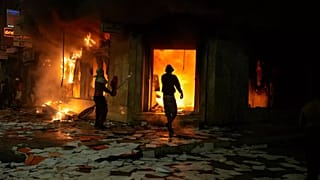 People torch and loot a bank as youth led protests calling for healthcare and education reforms turned violent in Sale, 1 October, 2025