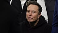 FILE - Elon Musk attends the finals for the NCAA wrestling championship, Saturday, 22 March 2025, in Philadelphia.