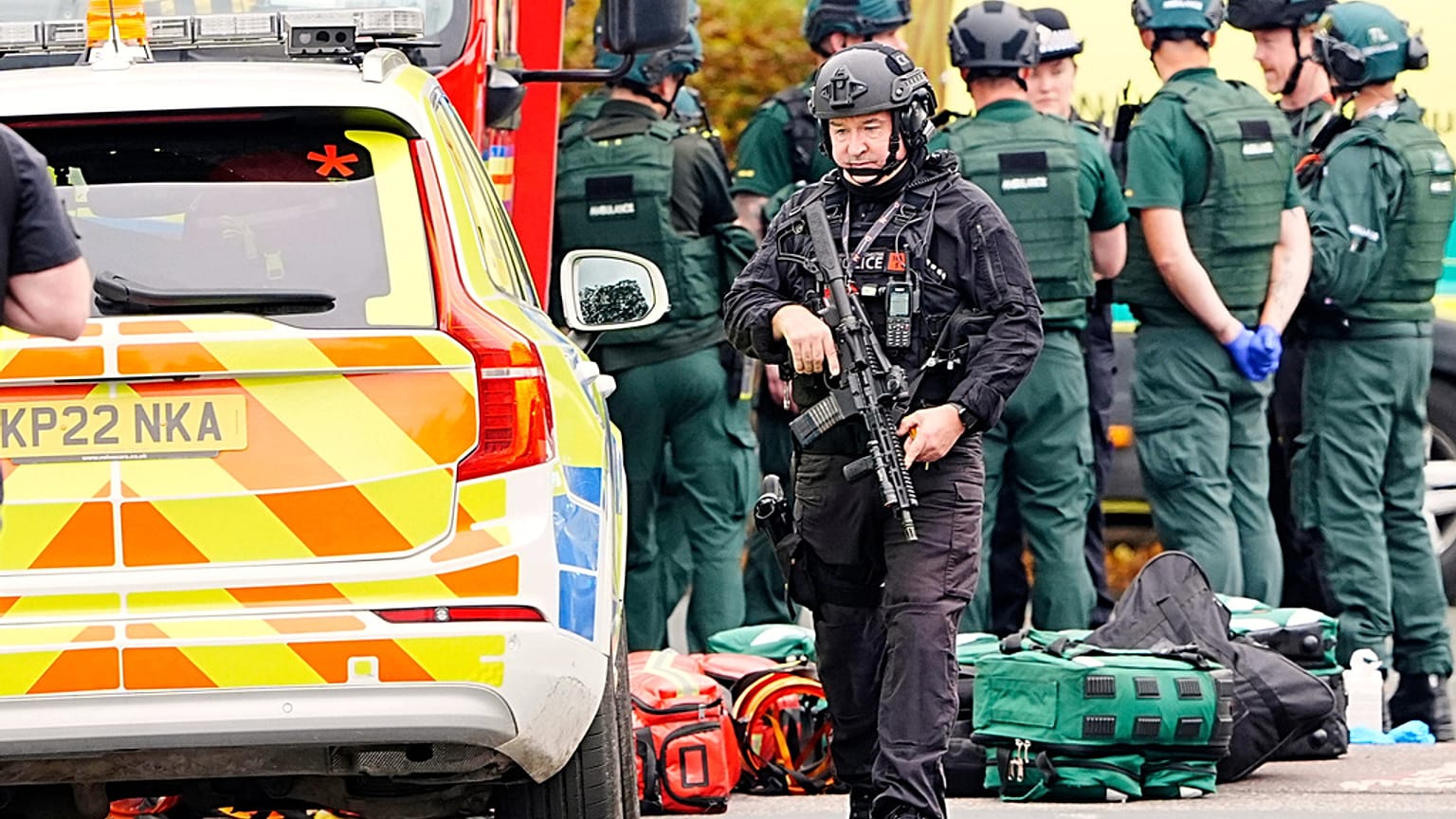 An armed police officer at the scene of a stabbing incident at Heaton Park Hebrew Congregation synagogue, in Manchester, 2 October 2025