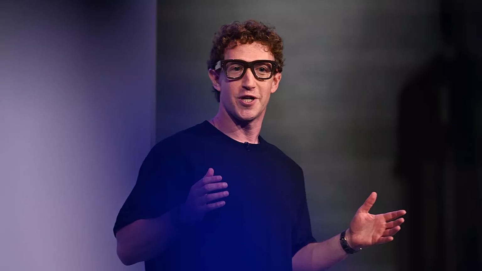 Meta CEO Mark Zuckerberg wears artificial intelligence-powered smart glasses as he speaks during the company's Connect developer conference Wednesday, Sept. 17, 2025, 