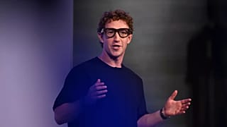 Meta CEO Mark Zuckerberg wears artificial intelligence-powered smart glasses as he speaks during the company's Connect developer conference Wednesday, Sept. 17, 2025, 