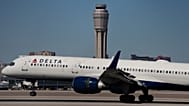 A plane lands at Harry Reid International Airport, Tuesday, Oct. 7, 2025, in Las Vegas.
