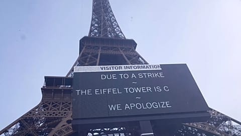 A board at the closed Eiffel Tower during a new round of strikes and protests to denounce spending cuts and demand higher taxes on the rich, 2 October, 2025 
