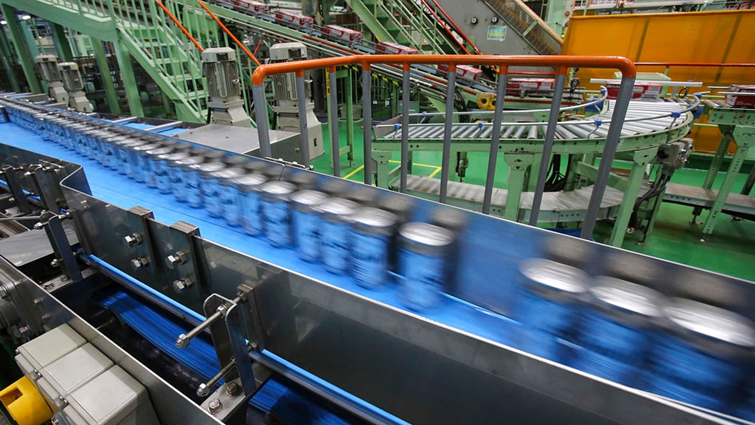 File - This 29 May 2017 photo shows the beer production line at an Asahi Breweries factory in Moriya near Tokyo.