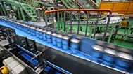 File - This 29 May 2017 photo shows the beer production line at an Asahi Breweries factory in Moriya near Tokyo.